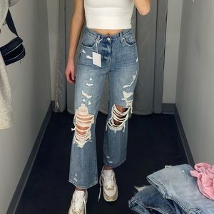 Pistols Ripped Blue Jeans